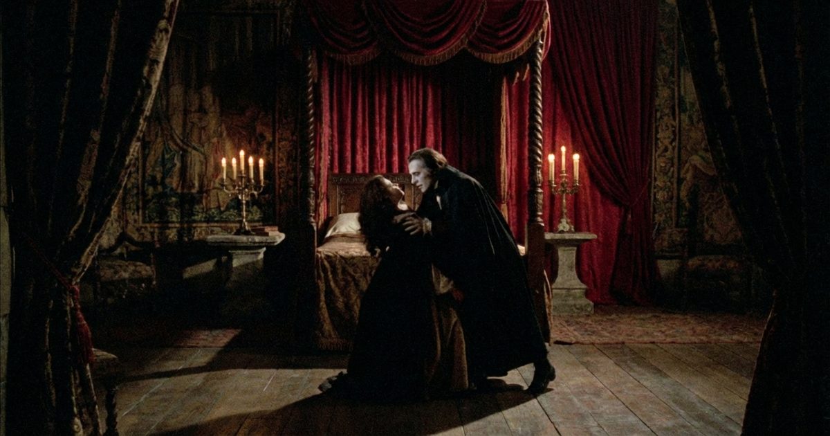 Gothic erotic horror: vampiric female figure in gothic setting with red light